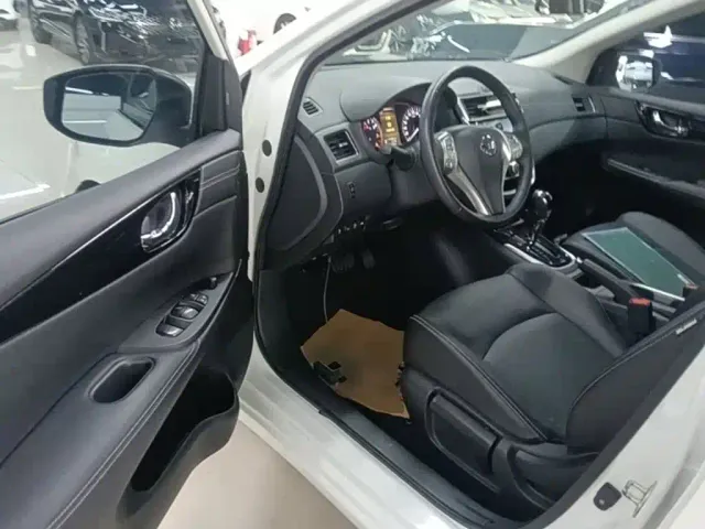 Nissan Tiida — Фото автомобиля 15
