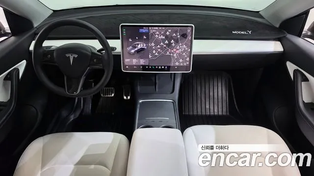 Tesla Model Y — Фото автомобиля 10