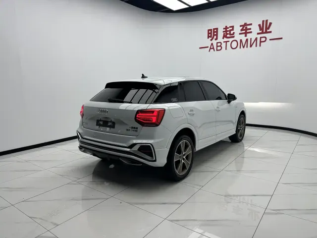 Audi Q2L — Фото автомобиля 9