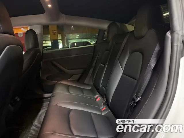 Tesla Model 3 — Фото автомобиля 11