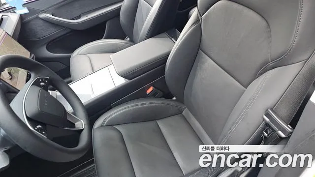 Tesla Model Y — Фото автомобиля 8