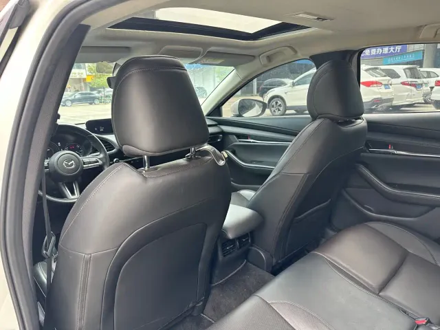 Mazda Axela — Фото автомобиля 15