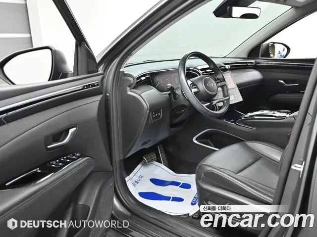 Hyundai Tucson Tucson (NX4) Бензин 1.6 Turbo 4WD — Фото автомобиля 10