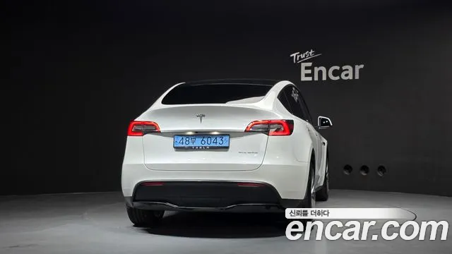 Tesla Model Y — Фото автомобиля 4