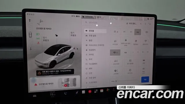 Tesla Model Y — Фото автомобиля 29