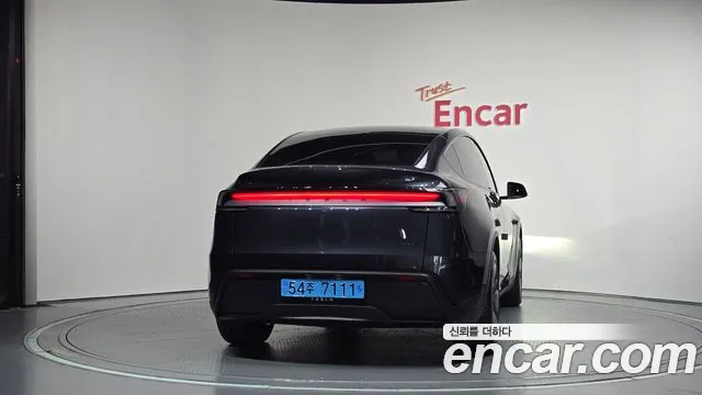 Tesla Model Y — Фото автомобиля 4