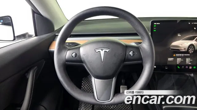 Tesla Model Y — Фото автомобиля 19