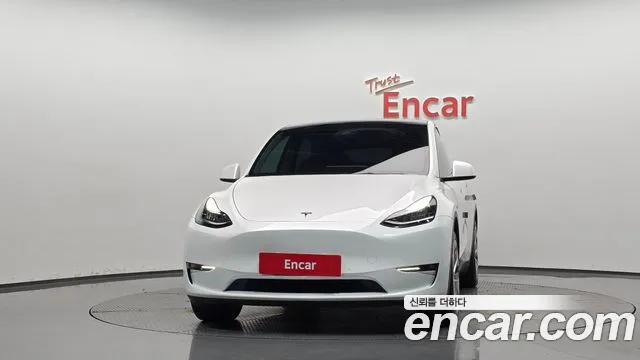 Tesla Model Y — Фото автомобиля 3