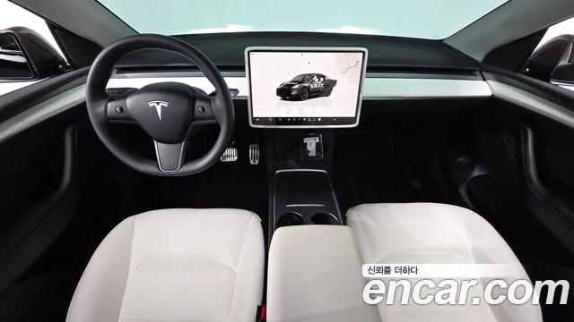 Tesla Model Y — Фото автомобиля 10