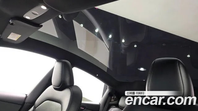 Tesla Model Y — Фото автомобиля 19