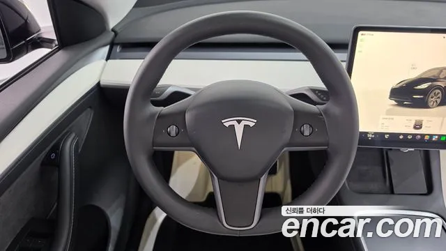 Tesla Model Y — Фото автомобиля 14