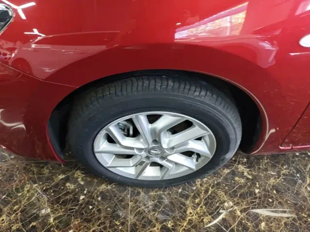 Nissan Tiida — Фото автомобиля 22