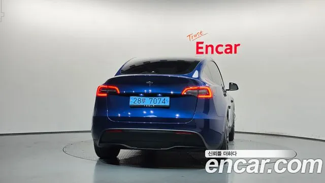 Tesla Model Y — Фото автомобиля 4