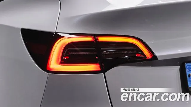 Tesla Model Y — Фото автомобиля 8