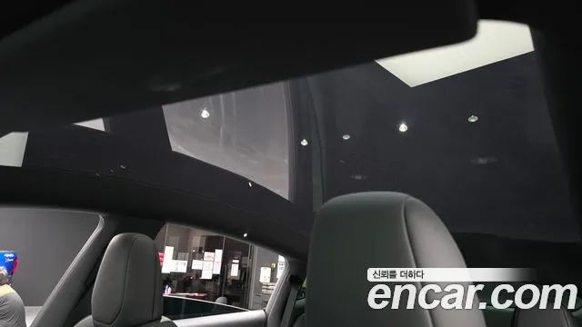 Tesla Model Y — Фото автомобиля 24
