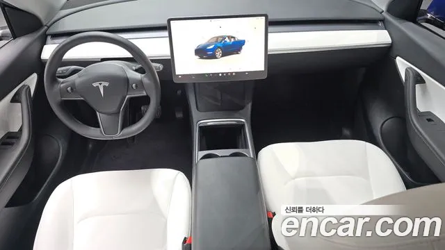 Tesla Model Y — Фото автомобиля 10