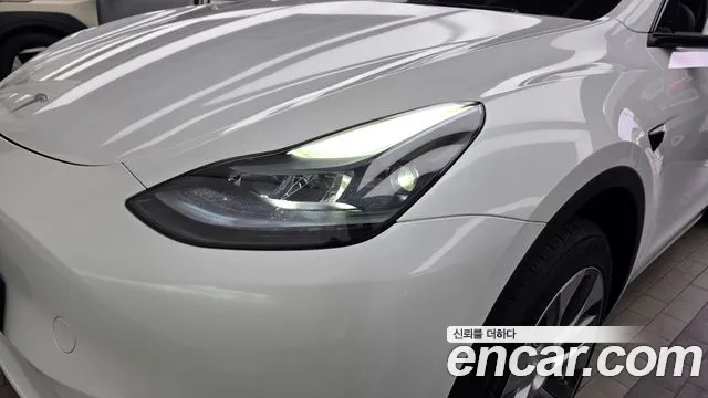Tesla Model Y — Фото автомобиля 7