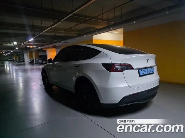 Tesla Model Y — Фото автомобиля 7