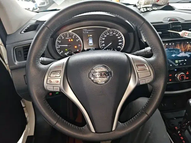 Nissan Tiida — Фото автомобиля 10