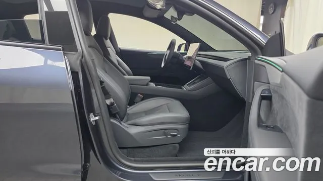 Tesla Model Y — Фото автомобиля 16