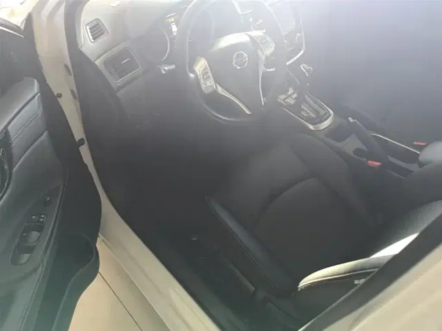 Nissan Tiida — Фото автомобиля 15