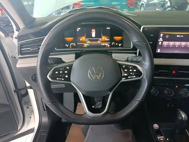 Volkswagen Tiguan L — Фото автомобиля 10