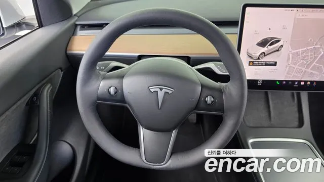 Tesla Model Y — Фото автомобиля 18