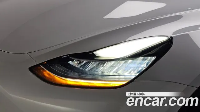 Tesla Model Y — Фото автомобиля 7