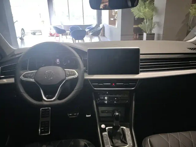 Volkswagen Tiguan L — Фото автомобиля 9