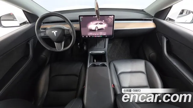 Tesla Model Y — Фото автомобиля 6