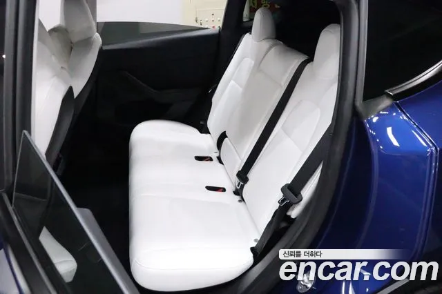 Tesla Model Y — Фото автомобиля 9