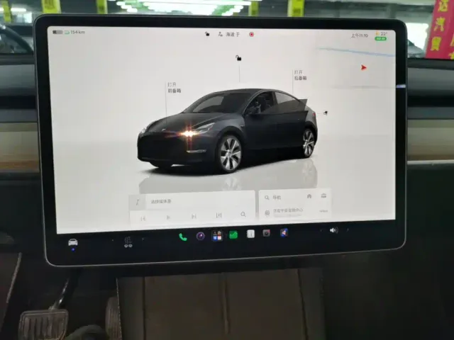 Tesla Model Y — Фото автомобиля 12