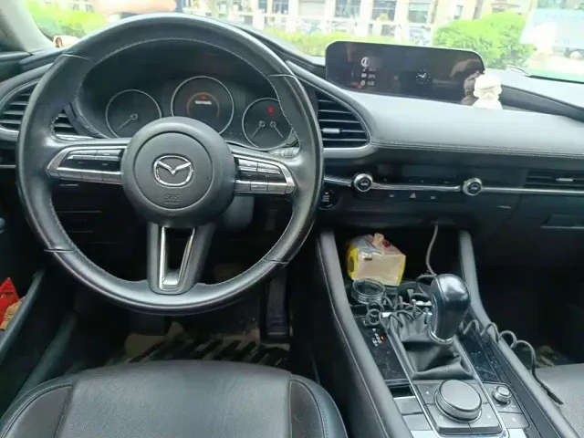 Mazda Axela — Фото автомобиля 12