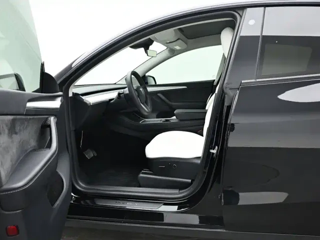 Tesla Model Y — Фото автомобиля 10