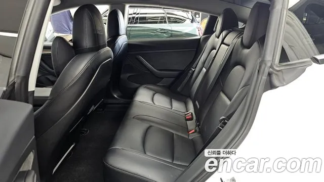 Tesla Model 3 — Фото автомобиля 8