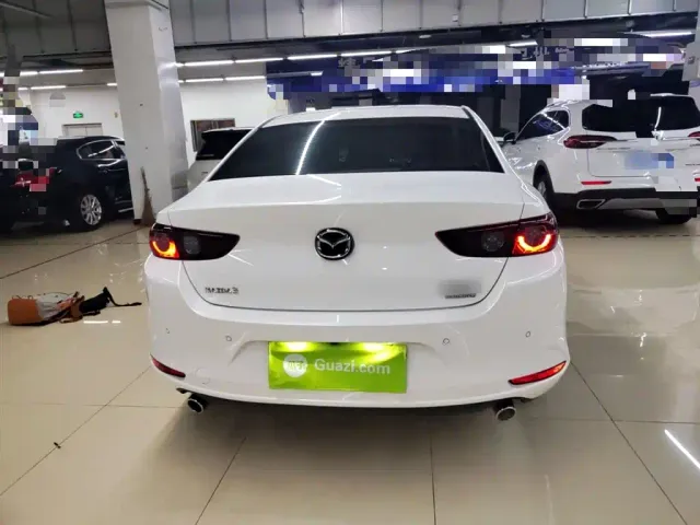 Mazda Axela — Фото автомобиля 5