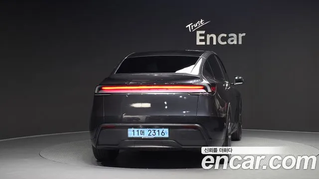 Tesla Model Y — Фото автомобиля 4