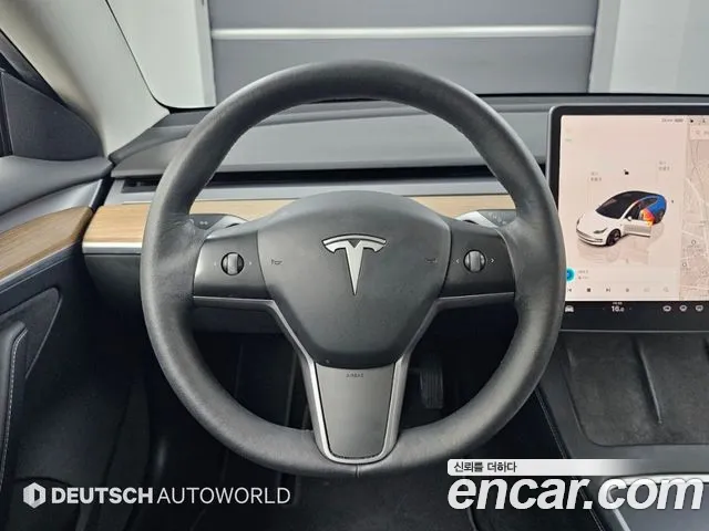 Tesla Model 3 — Фото автомобиля 13