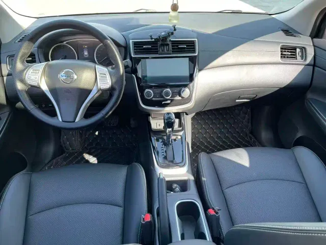 Nissan Tiida — Фото автомобиля 6