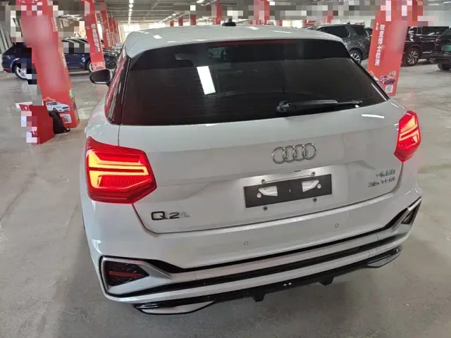 Audi Q2L — Фото автомобиля 5