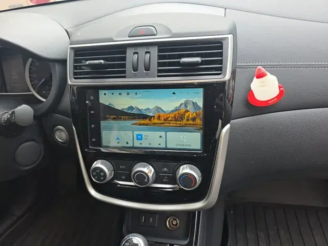 Nissan Tiida — Фото автомобиля 12