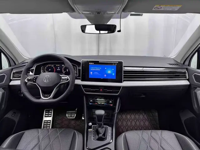 Volkswagen Tiguan L — Фото автомобиля 6