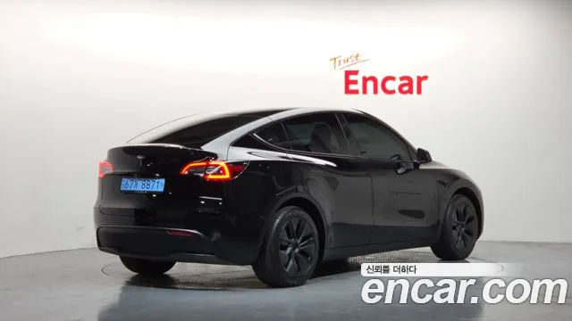 Tesla Model Y — Фото автомобиля 2