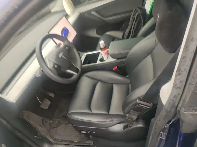 Tesla Model Y — Фото автомобиля 14