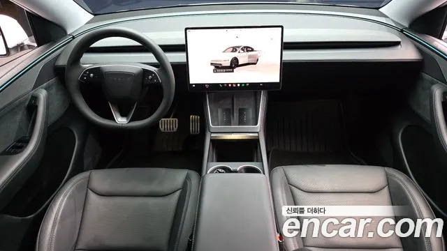 Tesla Model Y — Фото автомобиля 10