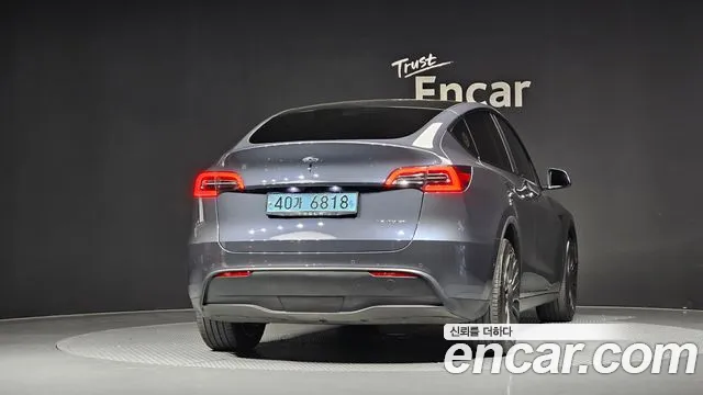 Tesla Model Y — Фото автомобиля 4