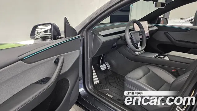 Tesla Model Y — Фото автомобиля 15