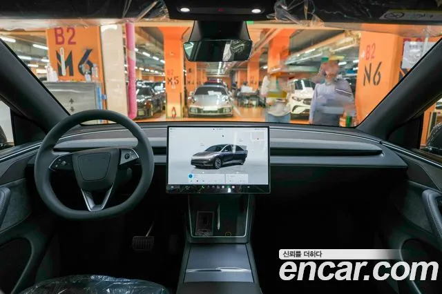 Tesla Model Y — Фото автомобиля 7