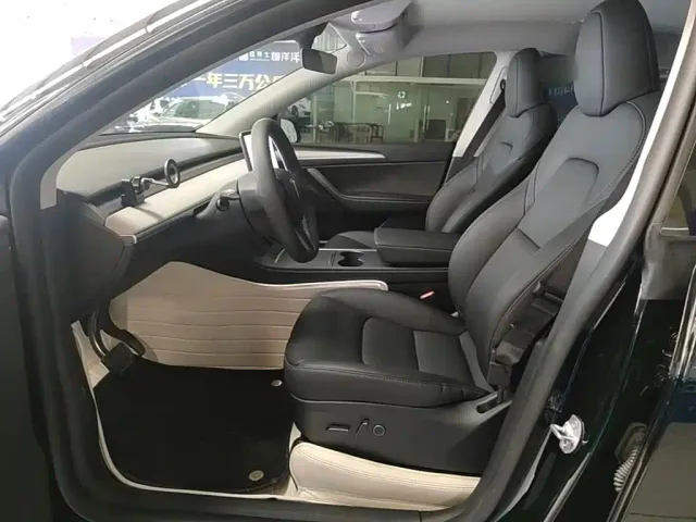 Tesla Model Y — Фото автомобиля 14