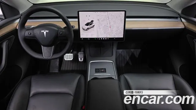 Tesla Model Y — Фото автомобиля 10